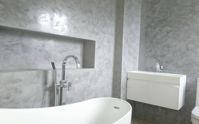 Image of a bathroom finished with light grey Decoveno