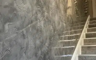 Image of Stair Wall finished with Decoveno Dark Grey Venetian Plaster