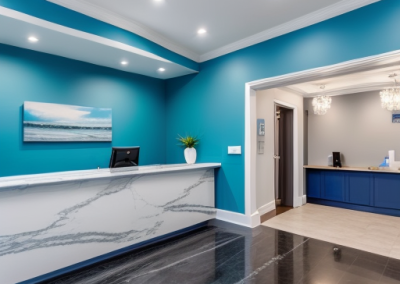 Image of a blue modern reception area with Venetian Plaster desk and walls