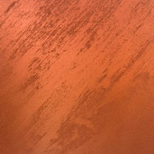 Close up image of a textured copper paint finish created with Decomin Copper Art Fine Grain Paint