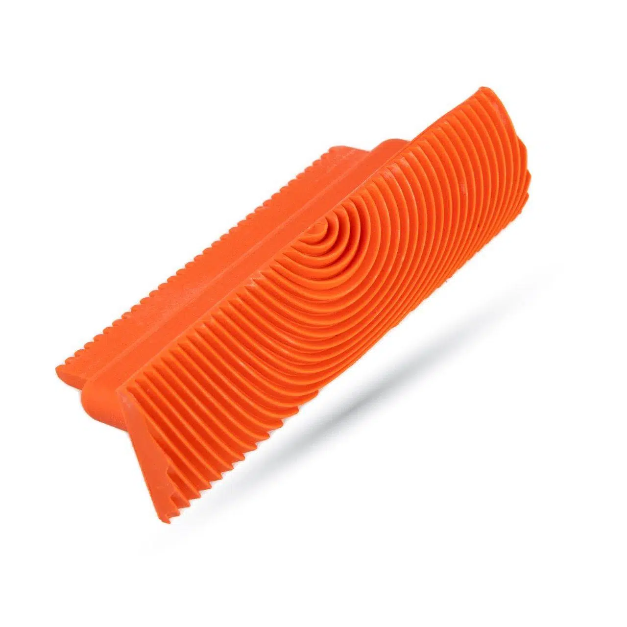 Close up image of a red Pennelli Rex Wood Graining Tool